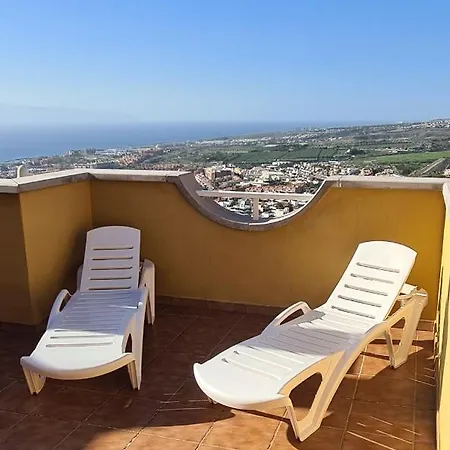 With A Serene Ocean And Mountain View Apartment