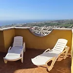 With A Serene Ocean And Mountain View Apartmán