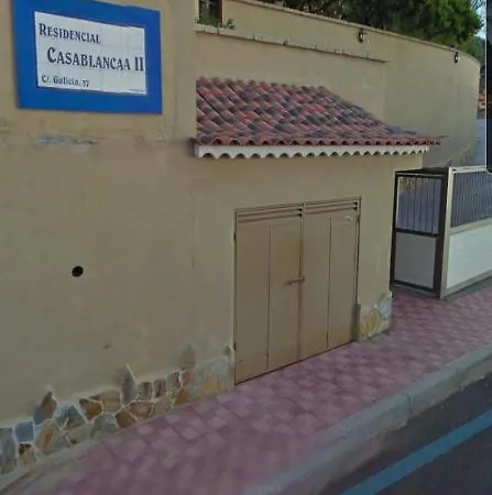 With A Serene Ocean And Mountain View Адехе